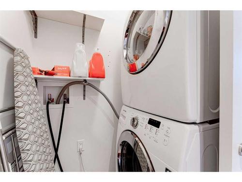 914 Remington Road Ne, Calgary, AB - Indoor Photo Showing Laundry Room