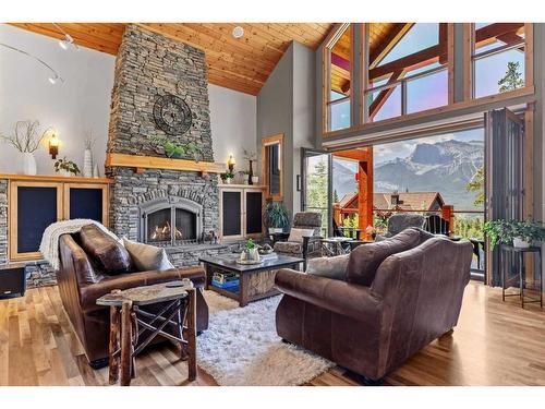 828 Silvertip Heights, Canmore, AB - Indoor Photo Showing Living Room With Fireplace