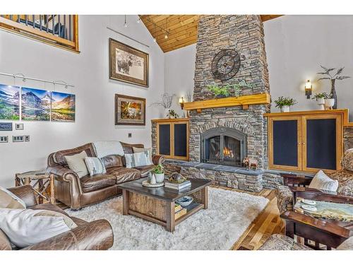 828 Silvertip Heights, Canmore, AB - Indoor Photo Showing Living Room With Fireplace