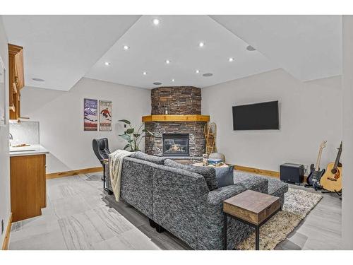 828 Silvertip Heights, Canmore, AB - Indoor Photo Showing Living Room With Fireplace