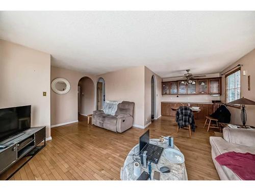 723 Raynard Crescent Se, Calgary, AB - Indoor Photo Showing Living Room