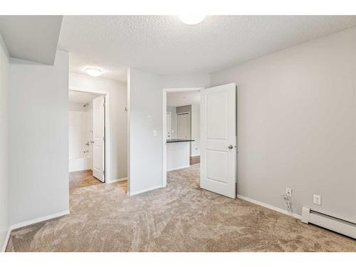 204-5 Saddlestone Way Ne, Calgary, AB - Indoor Photo Showing Other Room