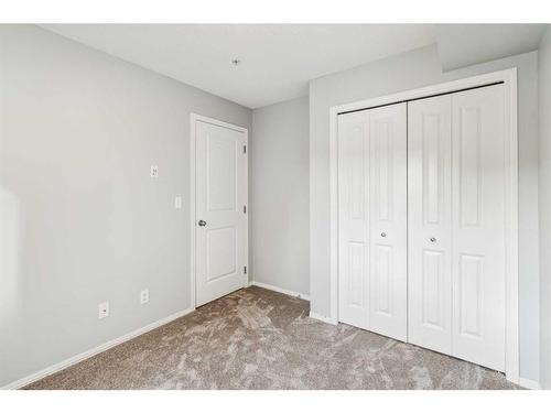 204-5 Saddlestone Way Ne, Calgary, AB - Indoor Photo Showing Other Room