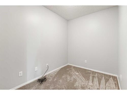 204-5 Saddlestone Way Ne, Calgary, AB - Indoor Photo Showing Other Room