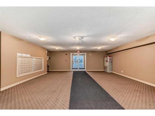 204-5 Saddlestone Way Ne, Calgary, AB - Indoor Photo Showing Other Room