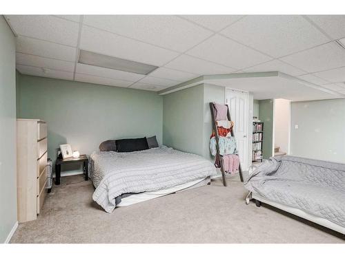 703-2001 Luxstone Boulevard Sw, Airdrie, AB - Indoor Photo Showing Bedroom