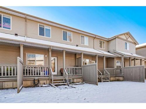 703-2001 Luxstone Boulevard Sw, Airdrie, AB - Outdoor With Deck Patio Veranda