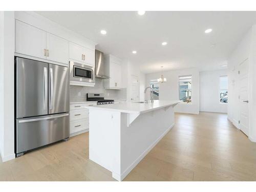 1418 Midtown Link Sw, Airdrie, AB - Indoor Photo Showing Kitchen With Upgraded Kitchen