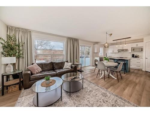 154 Rockbluff Close Nw, Calgary, AB - Indoor Photo Showing Living Room