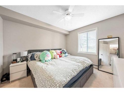 5103-604 8 Street Sw, Airdrie, AB - Indoor Photo Showing Bedroom