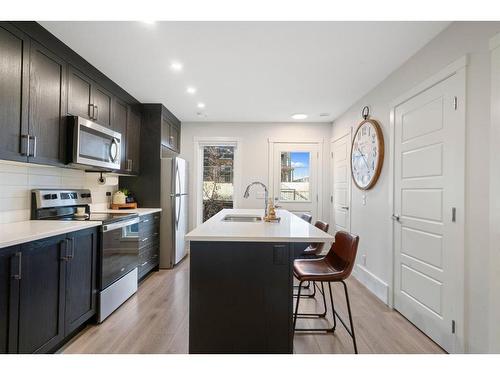 214-338 Seton Circle Se, Calgary, AB - Indoor Photo Showing Kitchen With Upgraded Kitchen