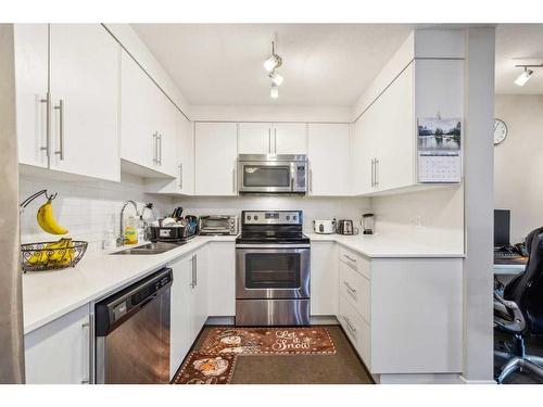 2206-302 Skyview Ranch Drive Ne, Calgary, AB - Indoor Photo Showing Kitchen With Stainless Steel Kitchen With Double Sink