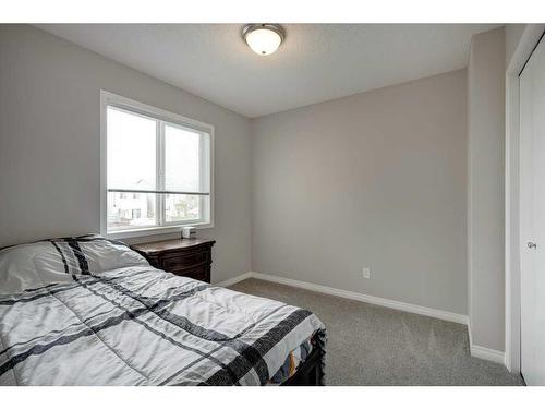 51 Prestwick Bay Se, Calgary, AB - Indoor Photo Showing Bedroom