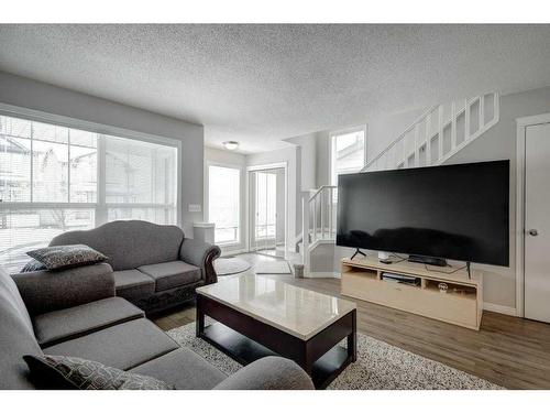 51 Prestwick Bay Se, Calgary, AB - Indoor Photo Showing Living Room