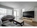 51 Prestwick Bay Se, Calgary, AB  - Indoor Photo Showing Living Room 