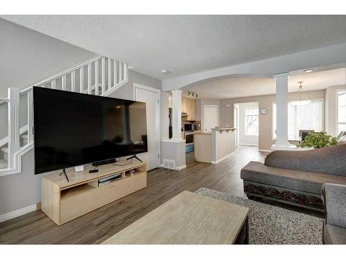 51 Prestwick Bay Se, Calgary, AB - Indoor Photo Showing Living Room