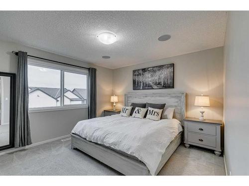 16 Walgrove Rise Se, Calgary, AB - Indoor Photo Showing Bedroom