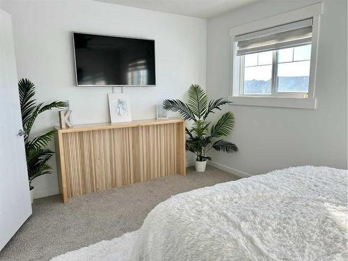 47-248 Kinniburgh Boulevard, Chestermere, AB - Indoor Photo Showing Bedroom