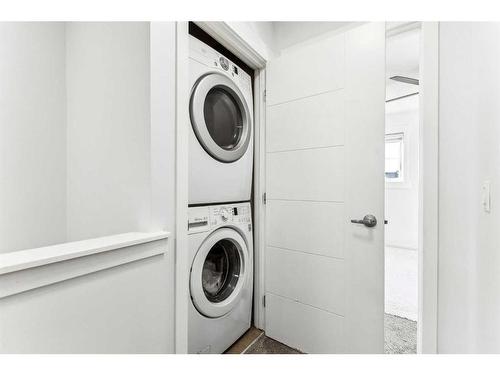 47-248 Kinniburgh Boulevard, Chestermere, AB - Indoor Photo Showing Laundry Room