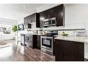 47-248 Kinniburgh Boulevard, Chestermere, AB  - Indoor Photo Showing Kitchen With Upgraded Kitchen 