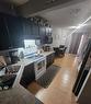 1201 Eagleview Place Nw, High River, AB  - Indoor Photo Showing Kitchen With Double Sink 