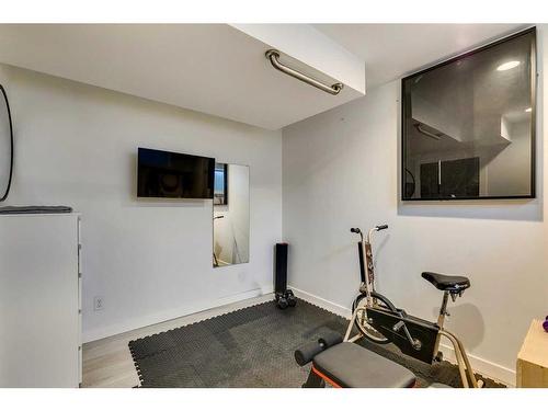 382 Walden Drive Se, Calgary, AB - Indoor Photo Showing Gym Room