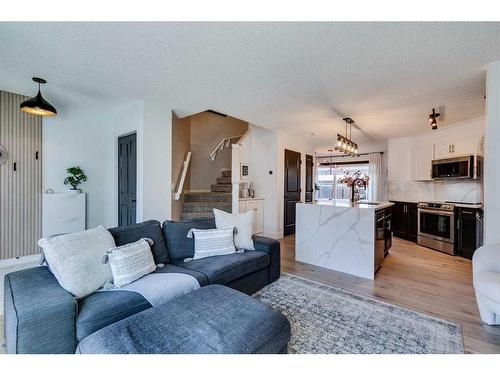 382 Walden Drive Se, Calgary, AB - Indoor Photo Showing Living Room