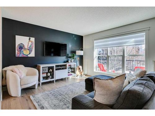 382 Walden Drive Se, Calgary, AB - Indoor Photo Showing Living Room