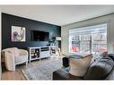 382 Walden Drive Se, Calgary, AB  - Indoor Photo Showing Living Room 