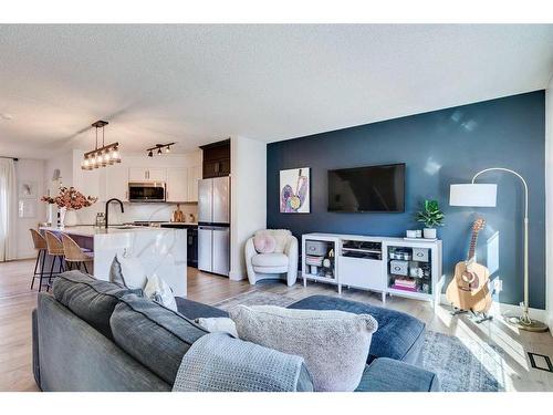 382 Walden Drive Se, Calgary, AB - Indoor Photo Showing Living Room