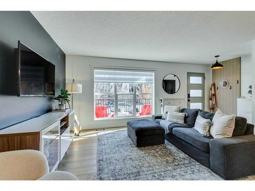 382 Walden Drive Se, Calgary, AB - Indoor Photo Showing Living Room