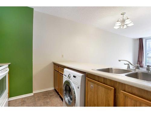 607-738 3 Avenue Sw, Calgary, AB - Indoor Photo Showing Laundry Room