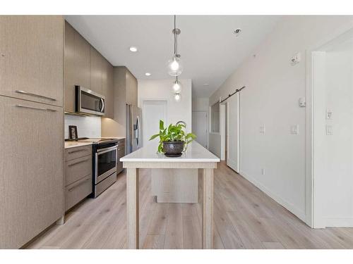 1404-76 Cornerstone Passage Ne, Calgary, AB - Indoor Photo Showing Kitchen With Upgraded Kitchen