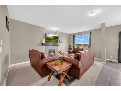 396 Skyview Shores Manor Ne, Calgary, AB - Indoor Photo Showing Living Room With Fireplace