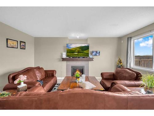 396 Skyview Shores Manor Ne, Calgary, AB - Indoor Photo Showing Living Room With Fireplace