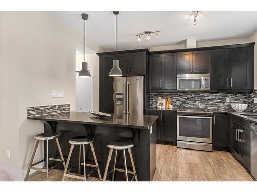 299 Mahogany Boulevard Se, Calgary, AB - Indoor Photo Showing Kitchen With Stainless Steel Kitchen With Upgraded Kitchen