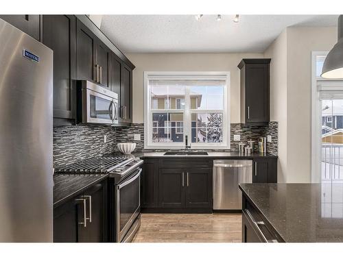 299 Mahogany Boulevard Se, Calgary, AB - Indoor Photo Showing Kitchen With Stainless Steel Kitchen With Upgraded Kitchen