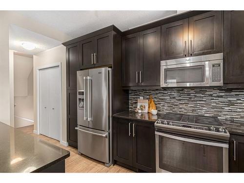 299 Mahogany Boulevard Se, Calgary, AB - Indoor Photo Showing Kitchen With Stainless Steel Kitchen With Upgraded Kitchen