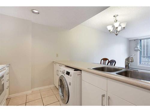 1105-738 3 Avenue Sw, Calgary, AB - Indoor Photo Showing Laundry Room