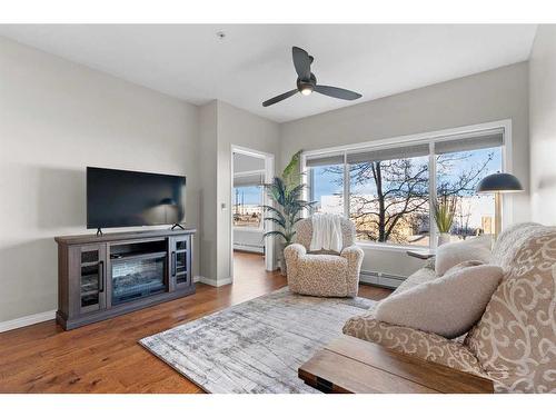 206-4403 67A Avenue, Olds, AB - Indoor Photo Showing Living Room