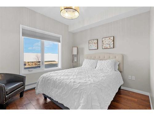 206-4403 67A Avenue, Olds, AB - Indoor Photo Showing Bedroom