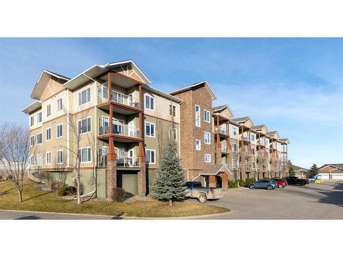 206-4403 67A Avenue, Olds, AB - Outdoor With Facade