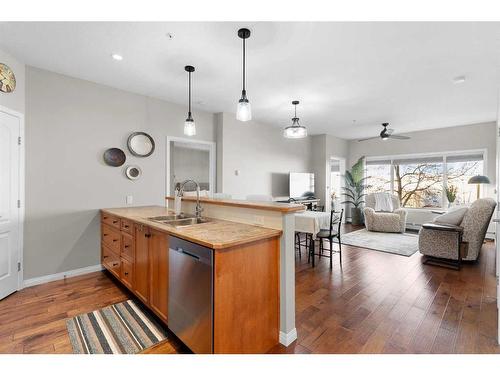 206-4403 67A Avenue, Olds, AB - Indoor Photo Showing Kitchen With Double Sink