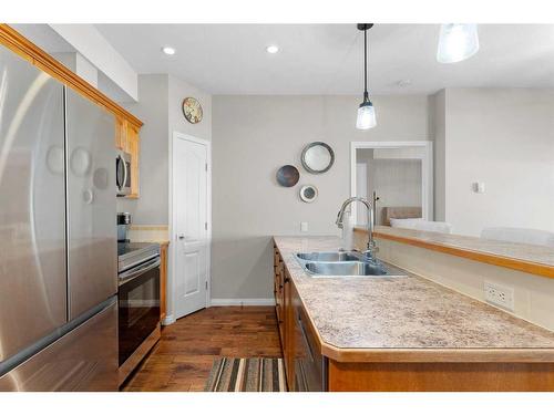 206-4403 67A Avenue, Olds, AB - Indoor Photo Showing Kitchen With Double Sink