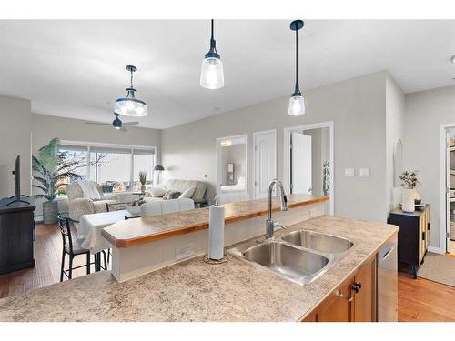 206-4403 67A Avenue, Olds, AB - Indoor Photo Showing Kitchen With Double Sink