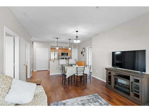 206-4403 67A Avenue, Olds, AB - Indoor Photo Showing Living Room