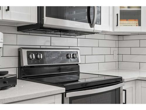 59 River Rock Way Se, Calgary, AB - Indoor Photo Showing Kitchen