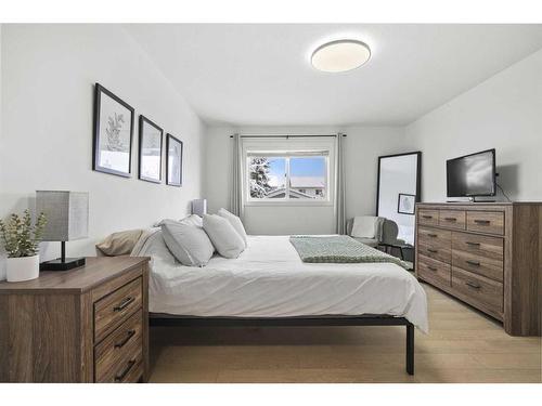 59 River Rock Way Se, Calgary, AB - Indoor Photo Showing Bedroom