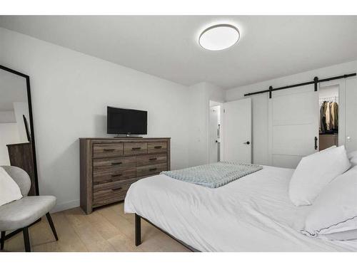 59 River Rock Way Se, Calgary, AB - Indoor Photo Showing Bedroom