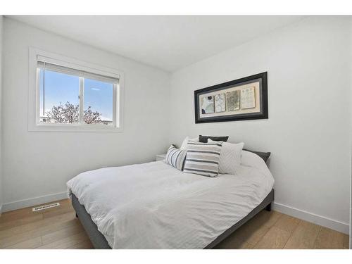 59 River Rock Way Se, Calgary, AB - Indoor Photo Showing Bedroom